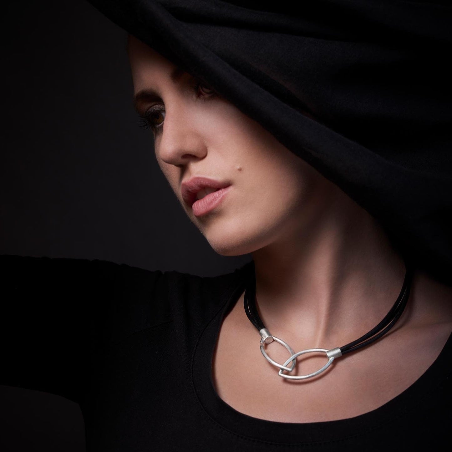 Black leather straps with 925 silver clasp in three lengths